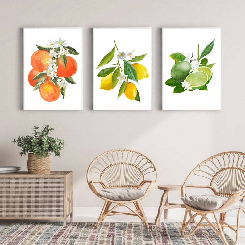 May include: Three watercolor paintings of citrus fruits. The first painting shows a branch of oranges with white blossoms. The second painting shows a branch of lemons with white blossoms. The third painting shows a branch of limes with white blossoms.