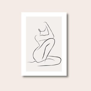 May include: A minimalist line art print featuring a seated figure in a graceful pose. The artwork is rendered in black lines against a neutral background, creating a modern and elegant aesthetic. The print is framed in a white border.