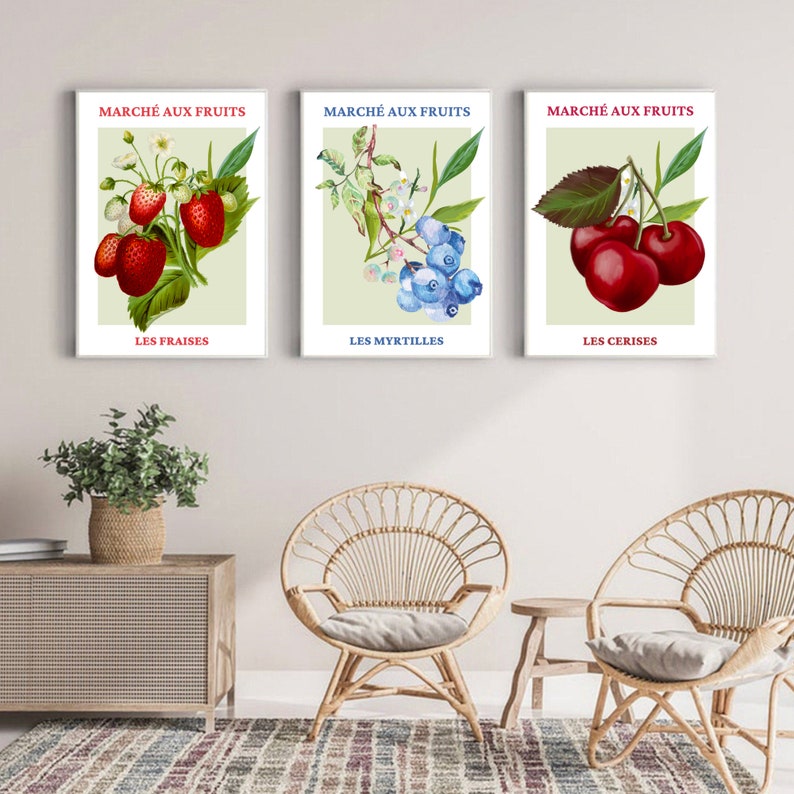 May include: Three vintage-style prints featuring illustrations of strawberries, blueberries, and cherries. Each print has a light green background with the French words "March&eacute; aux Fruits" and the name of the fruit in French at the bottom.