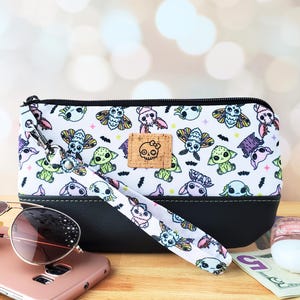 Monedero para teléfono con diseño de Cryptids