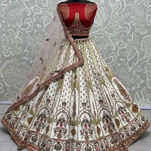 This outfit is called a black embellished lehenga choli More