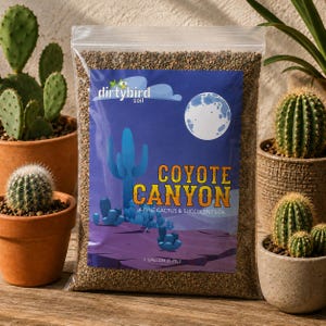 May include: A clear plastic bag filled with brown cactus and succulent soil. The label features a blue desert landscape with a full moon, a saguaro cactus, and the text Dirtybird Soil Coyote Canyon A Fine Cactus & Succulent Soil 1 Gallon (3.79L).