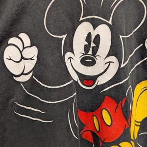 May include: A trio of ceramic mugs with a speckled, matte finish in light blue, cream, and grey. The mugs have a simple, modern design with a rounded shape and a comfortable handle. Ideal for tea or coffee.