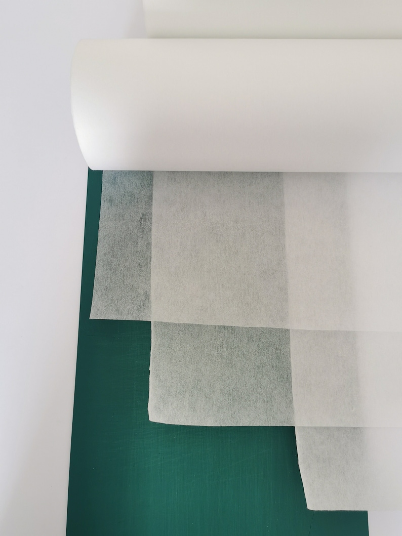 75 cm mellanlägg Strykbart vitt smältbart non-woven Lättviktigt medelviktigt kraftigt mellanlägg, tygbaksida, tygförstyvning, smältning bild 1