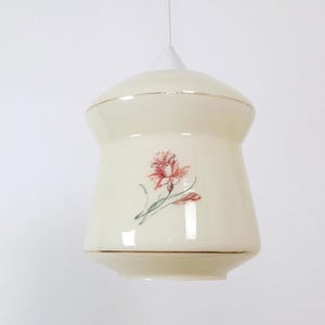 Vintage simple beige kitchen lamp with a flower and gold rim