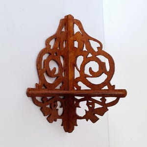 Hand carved crafted corner shelf 1970