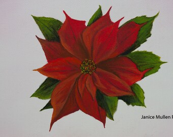 May include: A red poinsettia flower with green leaves painted on a white canvas. The painting is signed "Janice Mullen Painting" in the bottom right corner.