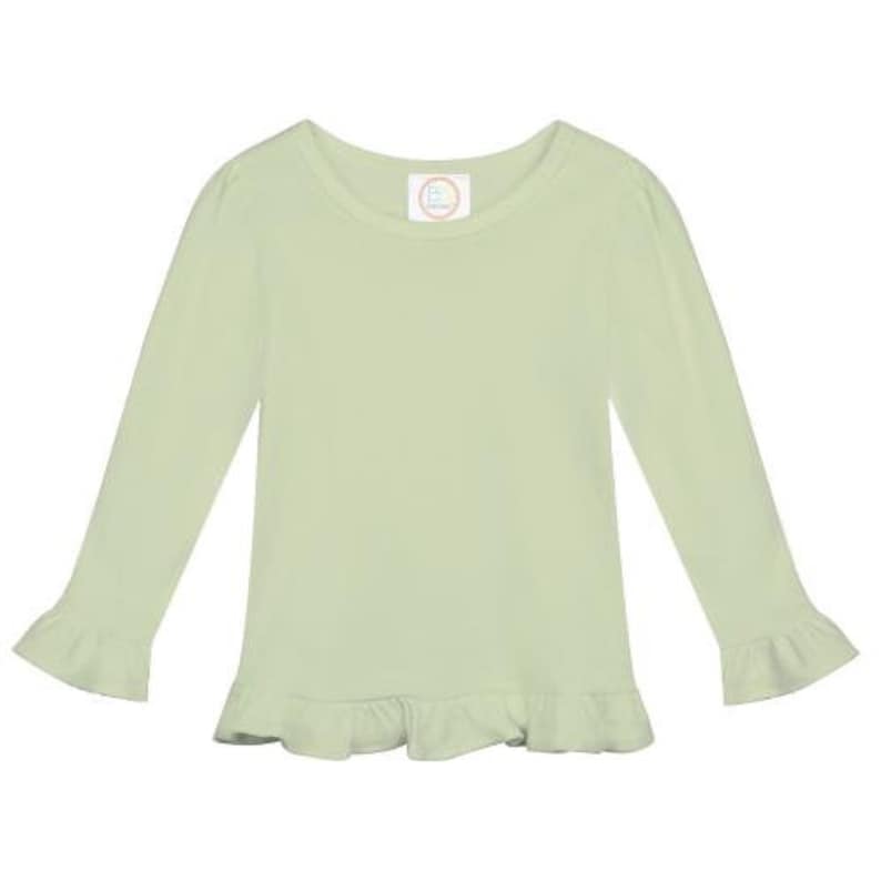 May include: A light green long-sleeved shirt with a ruffled hem and cuffs. The shirt has a round neckline and a small white label with the text "B" on the front.