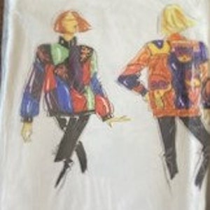 May include: A sewing pattern for a colorful jacket with a geometric design. The pattern is called "Catch the Wave" and is from the brand "Purrfection"  Sewing Wearables.