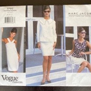 May include: Vogue Patterns sewing pattern #1703 for a white dress, a white skirt and top set, and a floral print dress. The pattern is by Marc Jacobs.