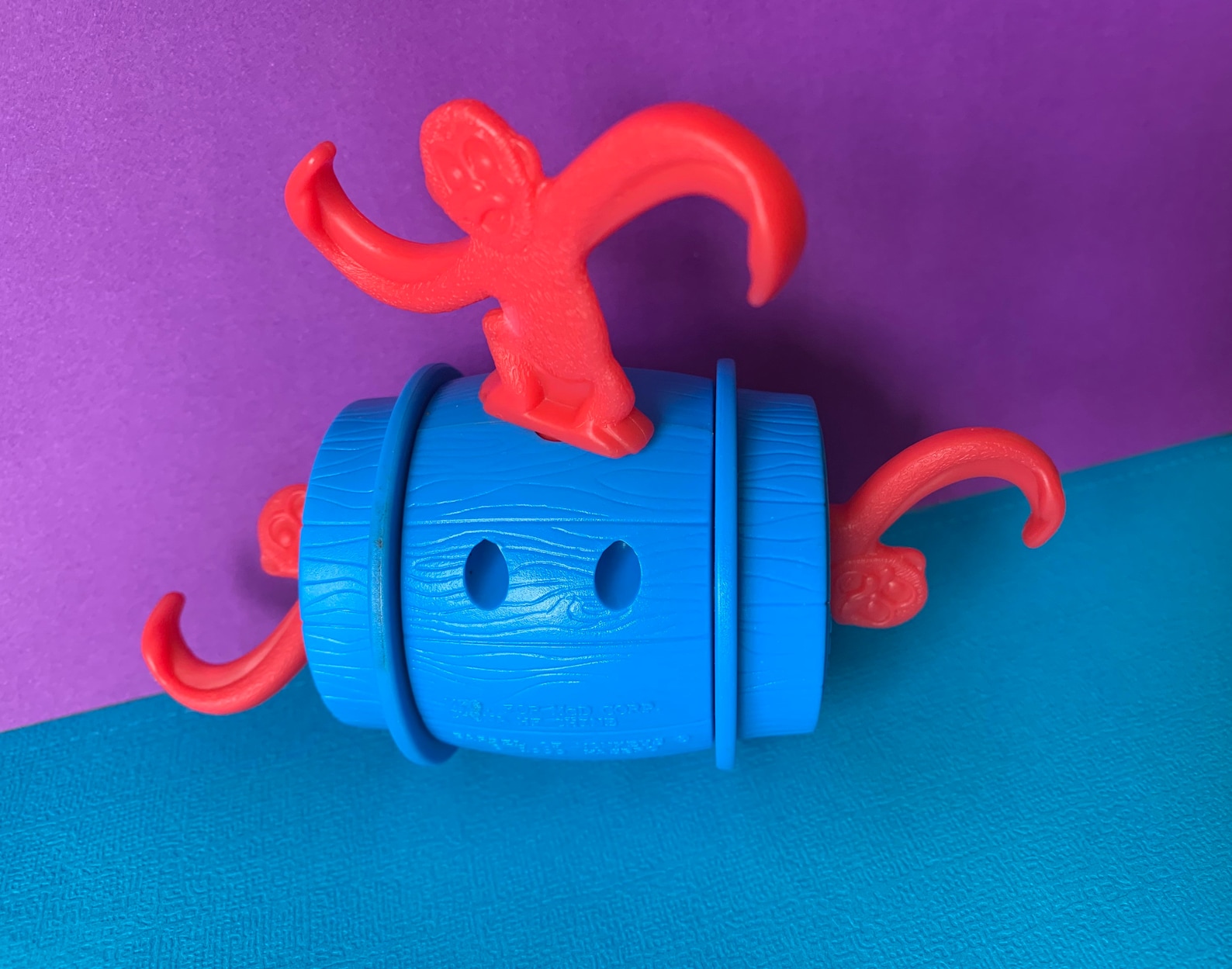 toy story monkey in a barrel