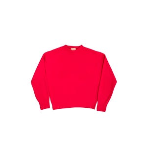 May include: A bright red sweater with a crew neck and long sleeves. The sweater is made of a soft material and is a solid color. The garment is displayed on a white background.