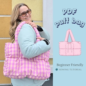 May include: A pink and white gingham puff bag with matching handles. The bag is held by a person wearing a light blue jacket. Text on the image reads "PDF puff bag" and "Beginner Friendly Sewing Tutorial".