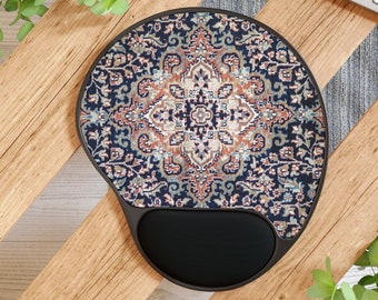 May include: A round black mouse pad with a colorful patterned design resembling a rug. The pad has a raised wrist rest.