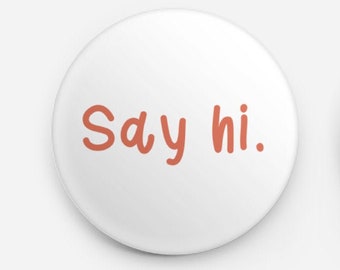 SAY HI Pin Back Button - 1.5 Inch, Craniofacial and facial difference Awareness, disability pride