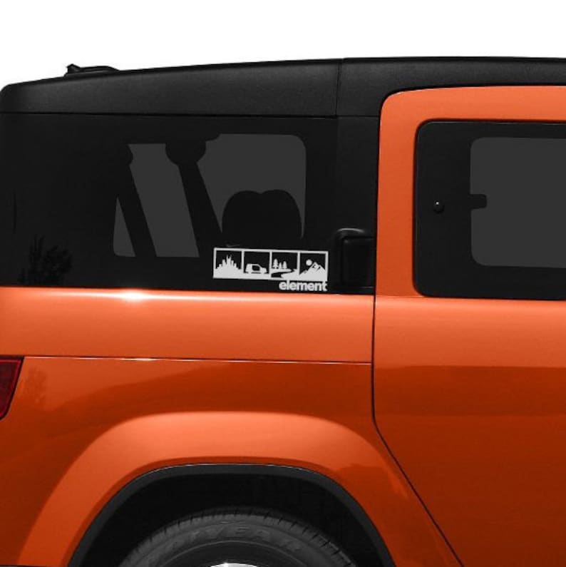 May include: An orange car with a white decal on the back window. The decal features three images of a car driving through a forest, a car driving through a desert, and a car driving up a mountain. The text "element" is below the images.