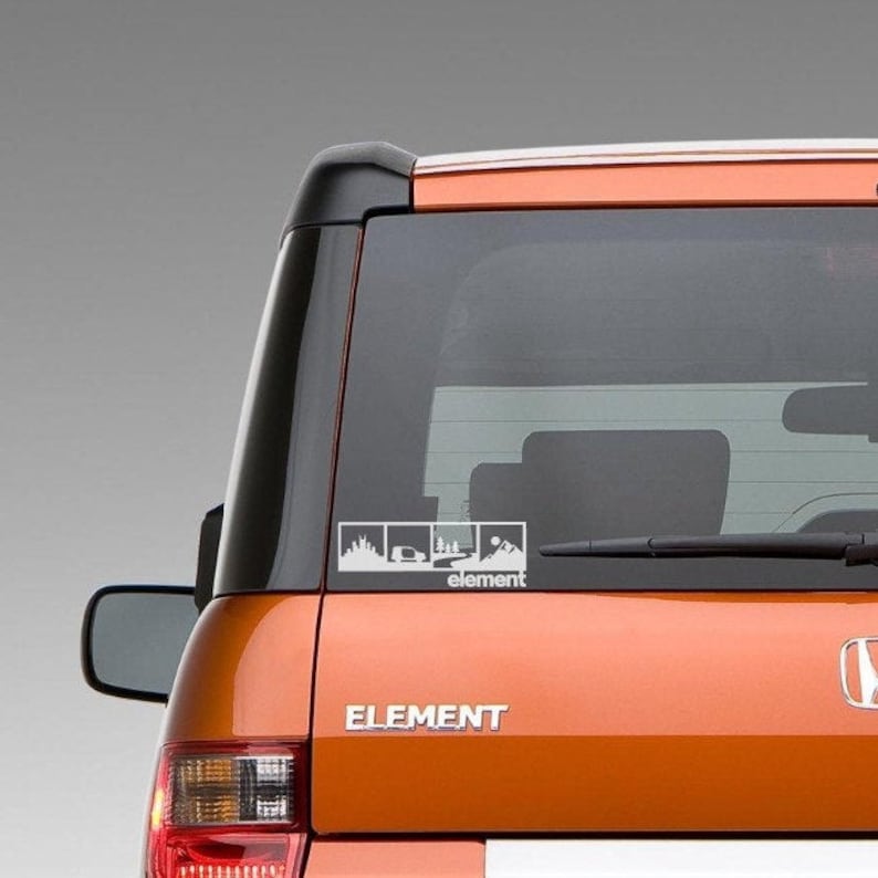 May include: A white decal on the back of an orange Honda Element. The decal features a series of three images depicting a car driving through a forest, a car driving through a mountain range, and a car driving through a desert. The text "element" is below the images.