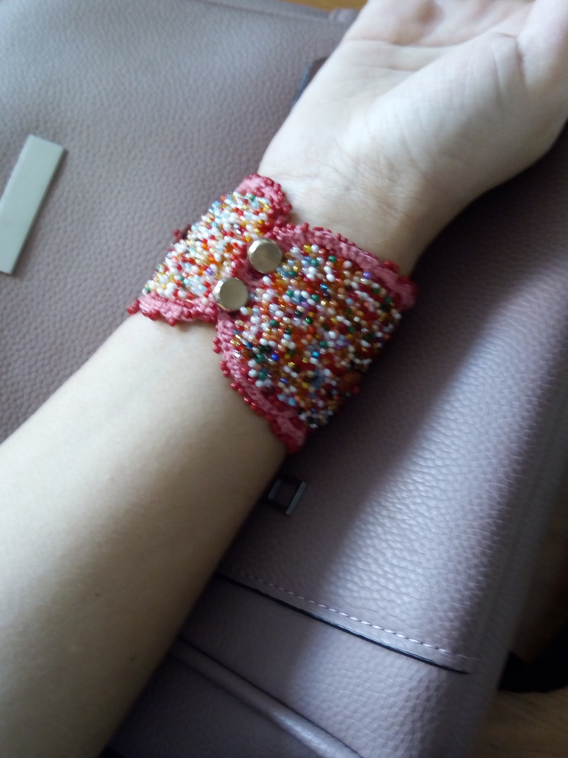 Red knitted bracelet is a decoration that will emphasize your Etsy