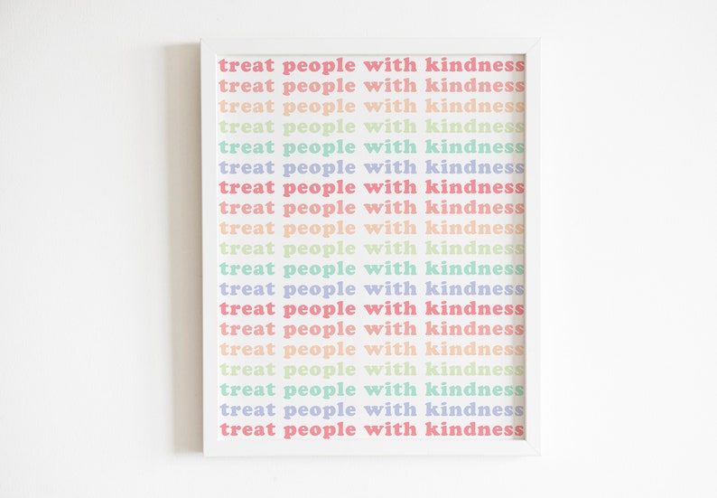 May include: A white framed print with the text "treat people with kindness" repeated 19 times in a rainbow of colors.
