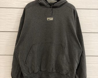 Vintage Nike-huvtröja med swoosh-motiv från 90-talet