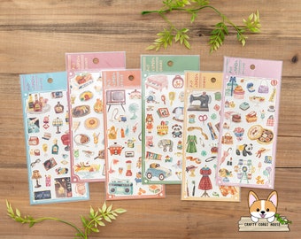 May include: Ten sheets of colorful sticker paper with various illustrations of vintage items, including a cafe, a sewing machine, a record player, a television, and a piano. The stickers are perfect for adding a touch of nostalgia to your planner, journal, or scrapbook.