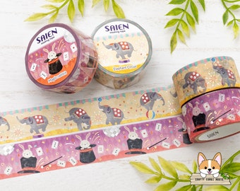 May include: Three rolls of washi tape featuring a circus theme. The tape designs include a magic rabbit, an elephant, and a circus tent. The tape is labeled "Saiyen Masking Tape".