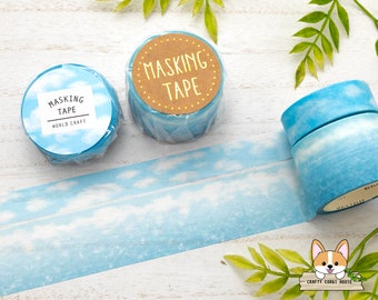 May include: Two rolls of blue and white masking tape with a cloud design. The tape is labeled "Masking Tape" and "World Craft".