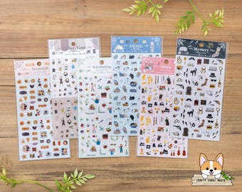 May include: A collection of sticker sheets with various themes, including "Coffee Time," "Sweetish," "Gardening," "Exotic," "Music," and "Mystery." Each sheet features small, colorful illustrations of related objects and icons. The stickers are packaged in clear plastic.