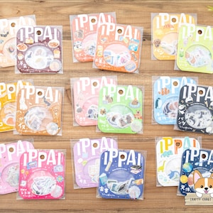 May include: A selection of sticker packs in various colours, each featuring the word "IPPAI". The packs contain stickers with themes such as animals, food, and space, and are packaged in clear plastic.