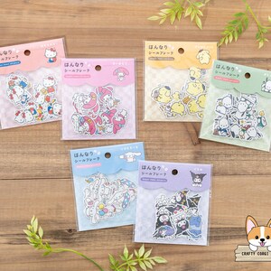 May include: Six packs of sticker sheets featuring various cartoon characters. Each pack has a pink, blue, or white background with the text "はんなり シールフレーク" in Japanese.