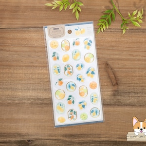 May include: A sheet of lemon-themed stickers with illustrations of lemons, leaves, and branches. The stickers are on a white background with a blue border. The text "LEMON" is printed in the top left corner.
