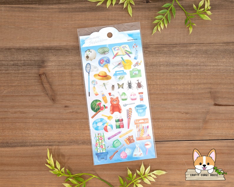 May include: A sheet of colorful stickers featuring summer-themed illustrations, including a watermelon, a bug, a hat, a bucket, a watering can, a flower, and a dragonfly. The stickers are on a blue background with white clouds.