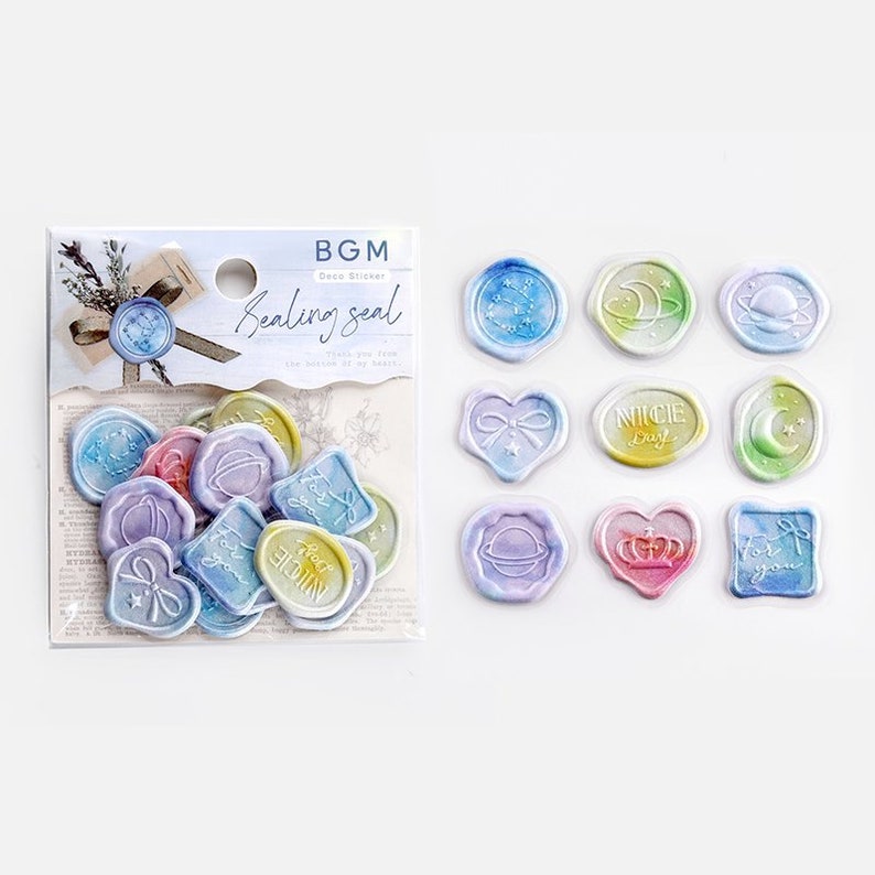 May include: A sheet of colorful, iridescent, wax seal stickers with various designs, including hearts, stars, planets, and the words "Nice Day" and "For You". The stickers are packaged in a clear plastic sheet with the text "BGM Deco Sticker Sealing Seal" printed on it.