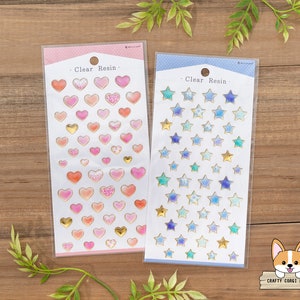 1 vel | NB | Stickervellen doorzichtige hars | (roze) hart - (blauwe) ster