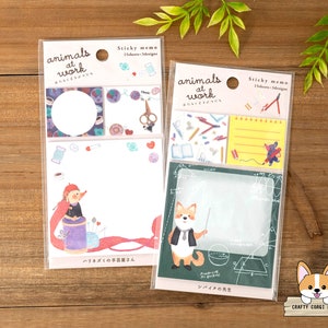 May include: Two packs of sticky notes featuring animal illustrations. The first pack has a hedgehog with a sewing machine and the text "animals at work" and "ハリネズミの手芸屋さん". The second pack has a Shiba Inu dog with a pointer and the text "animals at work" and "シバイヌの先生".