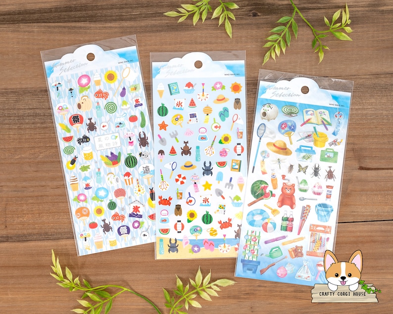 May include: Three sheets of colorful summer themed stickers with images of watermelon, ice cream, bugs, and other summery items. The stickers are packaged in clear plastic sleeves.