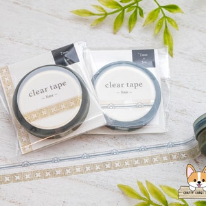 May include: Two rolls of clear tape with a decorative border design. The tape is 7mm wide and 3m long. The tape is packaged in clear plastic with a label that says "clear tape - line".
