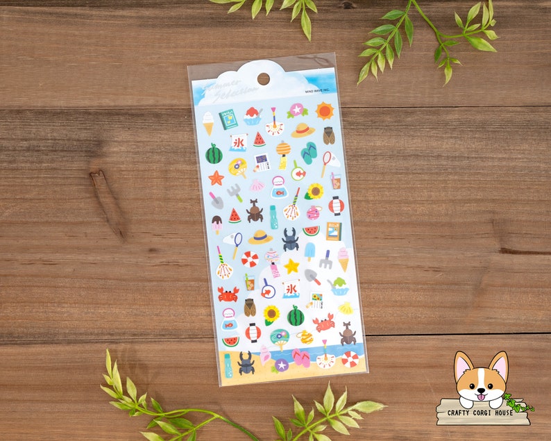 May include: A sheet of colorful summer-themed stickers featuring images of ice cream, watermelon, seashells, crabs, and more. The stickers are on a white background with a blue border.