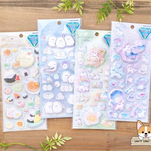 May include: Three sheets of colorful sticker paper with various cute animal and food designs. The stickers are perfect for decorating journals, planners, and other craft projects.