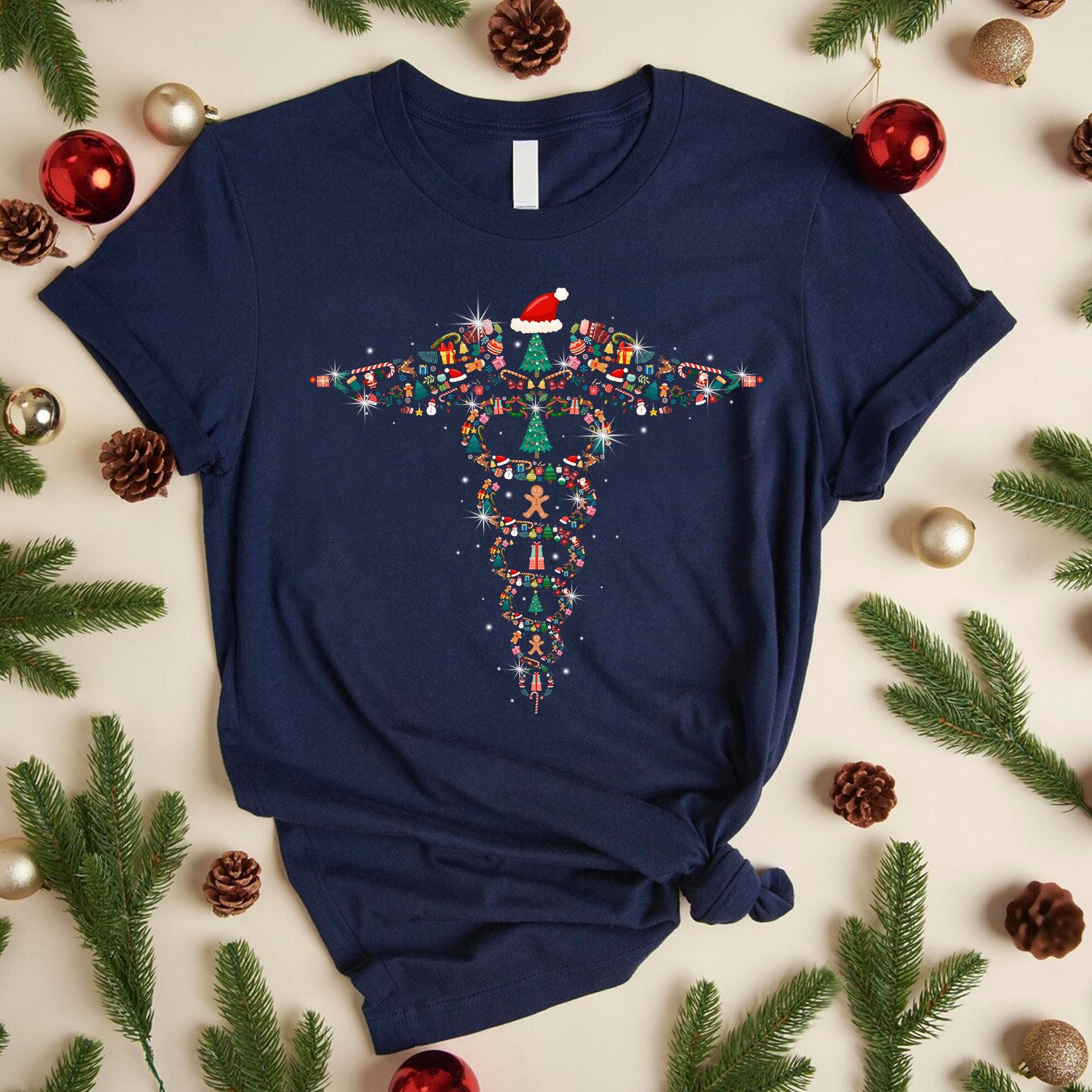 面白いカドゥケウスのクリスマスTシャツ、かわいい看護師のクリスマス