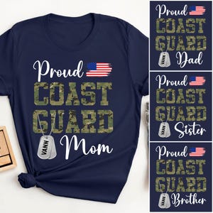 May include: Navy blue t-shirt with the words "Proud Coast Guard Mom" in white script and camouflage print. Includes an American flag graphic and a dog tag. Additional shirts say "Dad", "Sister", and "Brother".