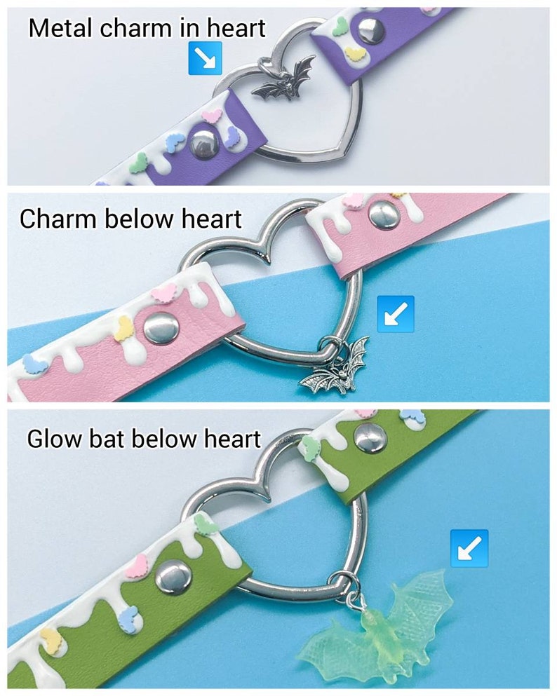 May include: A heart-shaped choker necklace with a silver metal charm in the center. The choker is made of purple leather with white and pastel-colored hearts. The charm is a bat with a glow-in-the-dark finish.