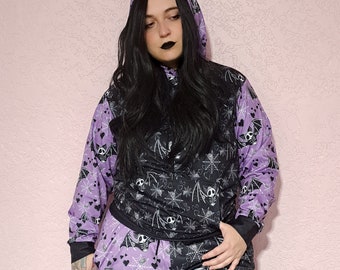 Pastel Goth Fleece Pullover Hoodie, Kawaii Spooky Skeleton Bat Spider Web Print Color Block Black & Pastel Purple, Cute Goth Emo Hoodie