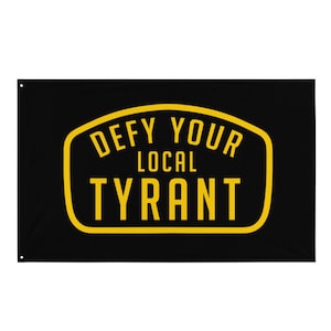 May include: Black flag with a yellow banner that reads "Defy Your Local Tyrant".