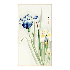 May include: A vertical wall art print featuring a watercolor painting of blue and white iris flowers with long green stems and leaves. The artwork includes delicate brushwork, a light cream background, and black Japanese calligraphy with a red seal.