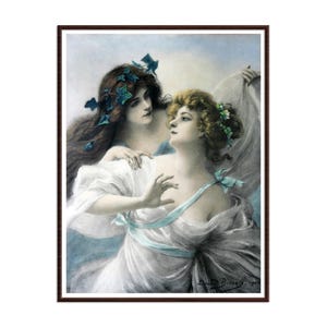 May include: A framed art print depicting two figures with flowing hair and white garments. One figure has dark hair adorned with ivy leaves, while the other has light brown hair. They are draped in white fabric with light blue ribbons.
