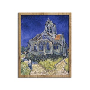 May include: A framed print of a painting depicting a church with a tall bell tower under a dark blue sky. The artwork features a path leading to the church and a person walking on the path. The frame is made of wood.
