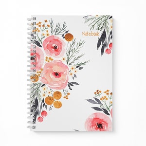May include: A white spiral bound notebook with a floral design featuring pink and red flowers, green leaves, and yellow accents. The text "Notebook" is printed in orange on the cover.