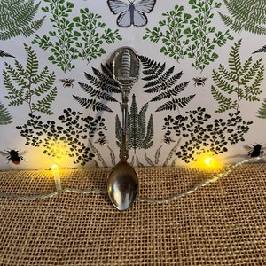 A vintage Collectible souvenir spoon from the city of Pisa with leaning tower