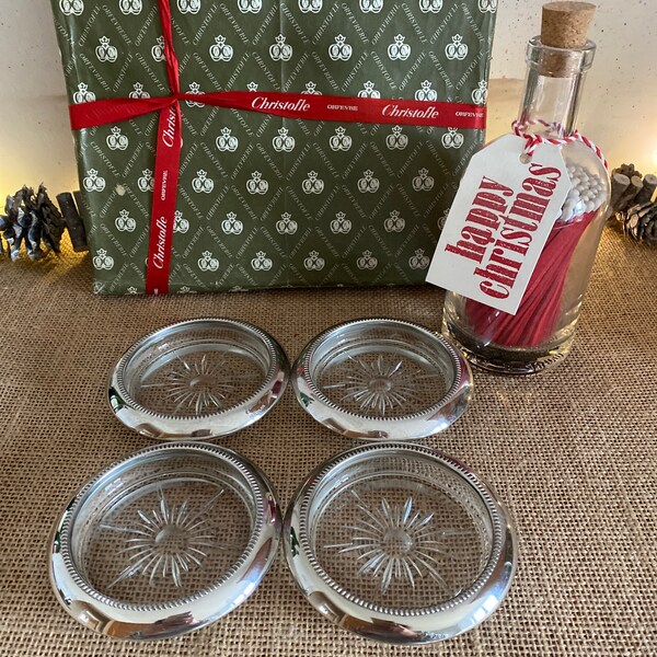 A fabulous boxed set of 4 Christofle silver plated  pressed glass coasters stamped Leonard silverplate